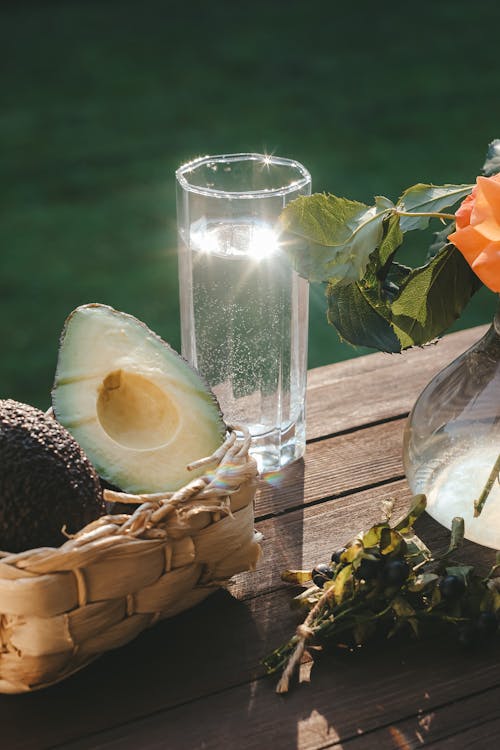 Free Avocado Fruit in a Basket Beside a Drink Stock Photo