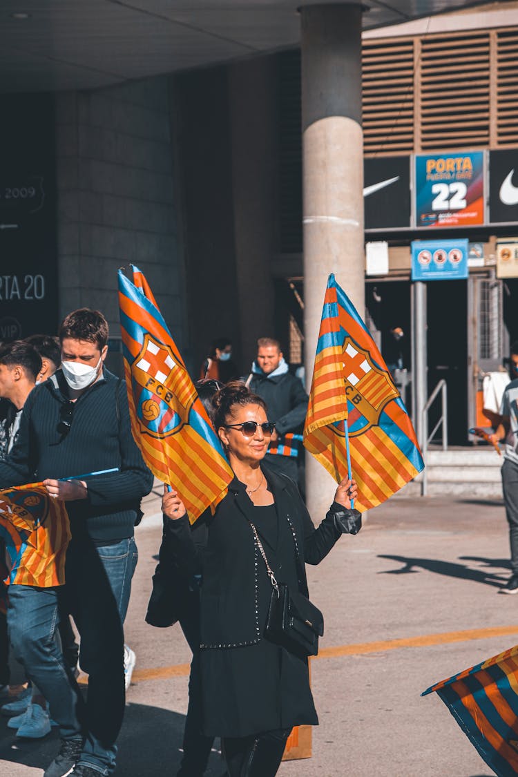 People With Barcelona Flags