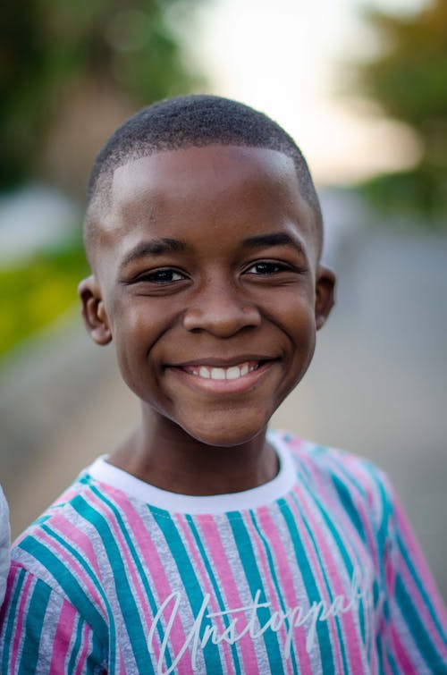Close-Up Shot of a Boy Smiling