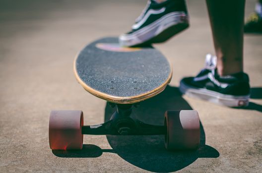 Shallow Focus Photography of Longboard
