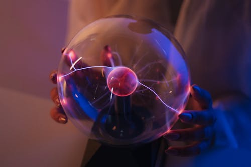 Magnetic Ball in Womans Hands