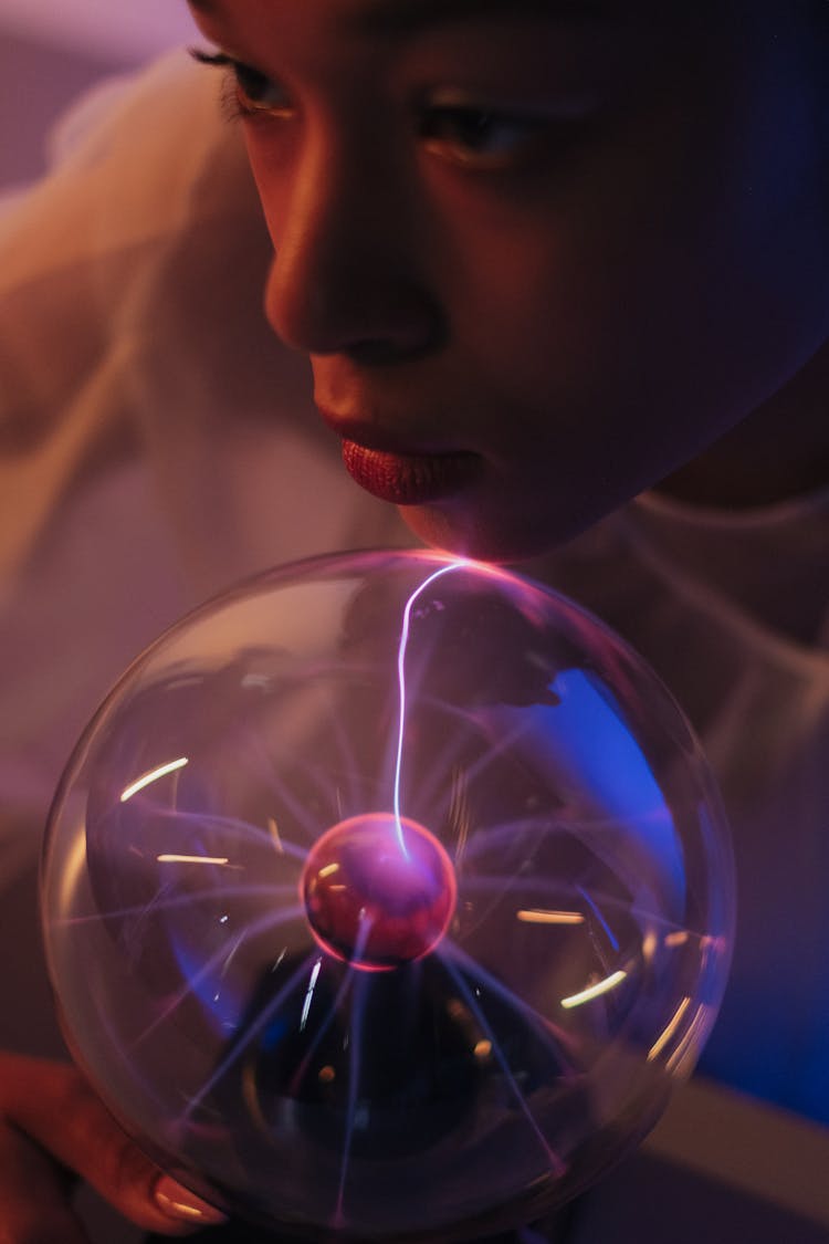 Close Up On Woman With Magnetic Ball