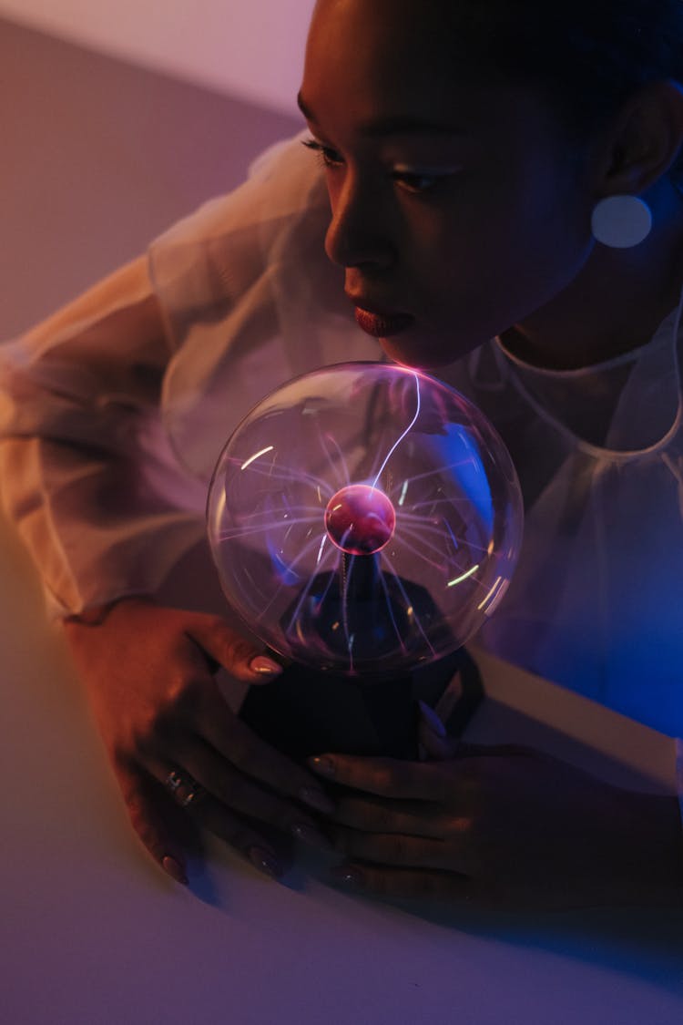 Woman With Magnetic Ball