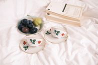 White and Red Floral Ceramic Plate With Fruits