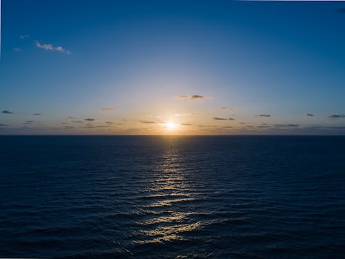 Silhouette Photo of Body of Water