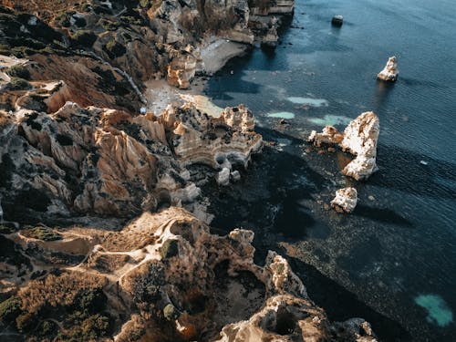 Aerial View of Rock Formation on the Shore