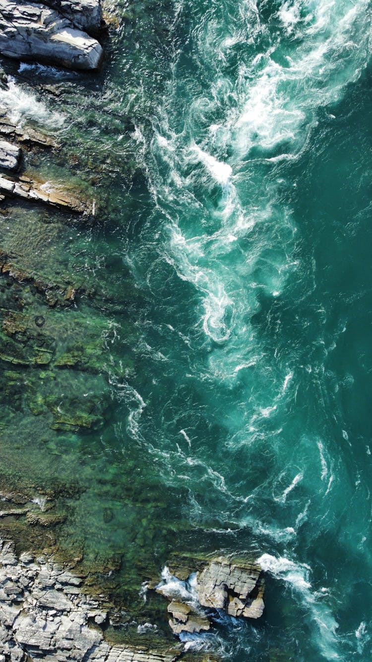 Waves Crashing On Rocks