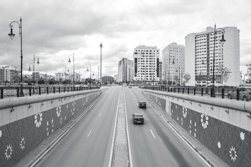 Free Black and White Photo of a Highway in a City Stock Photo