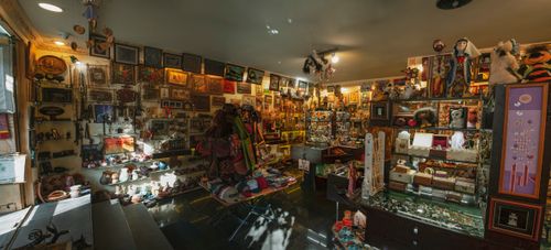 Free Vibrant interior showcasing diverse souvenirs, arts, and crafts. Stock Photo