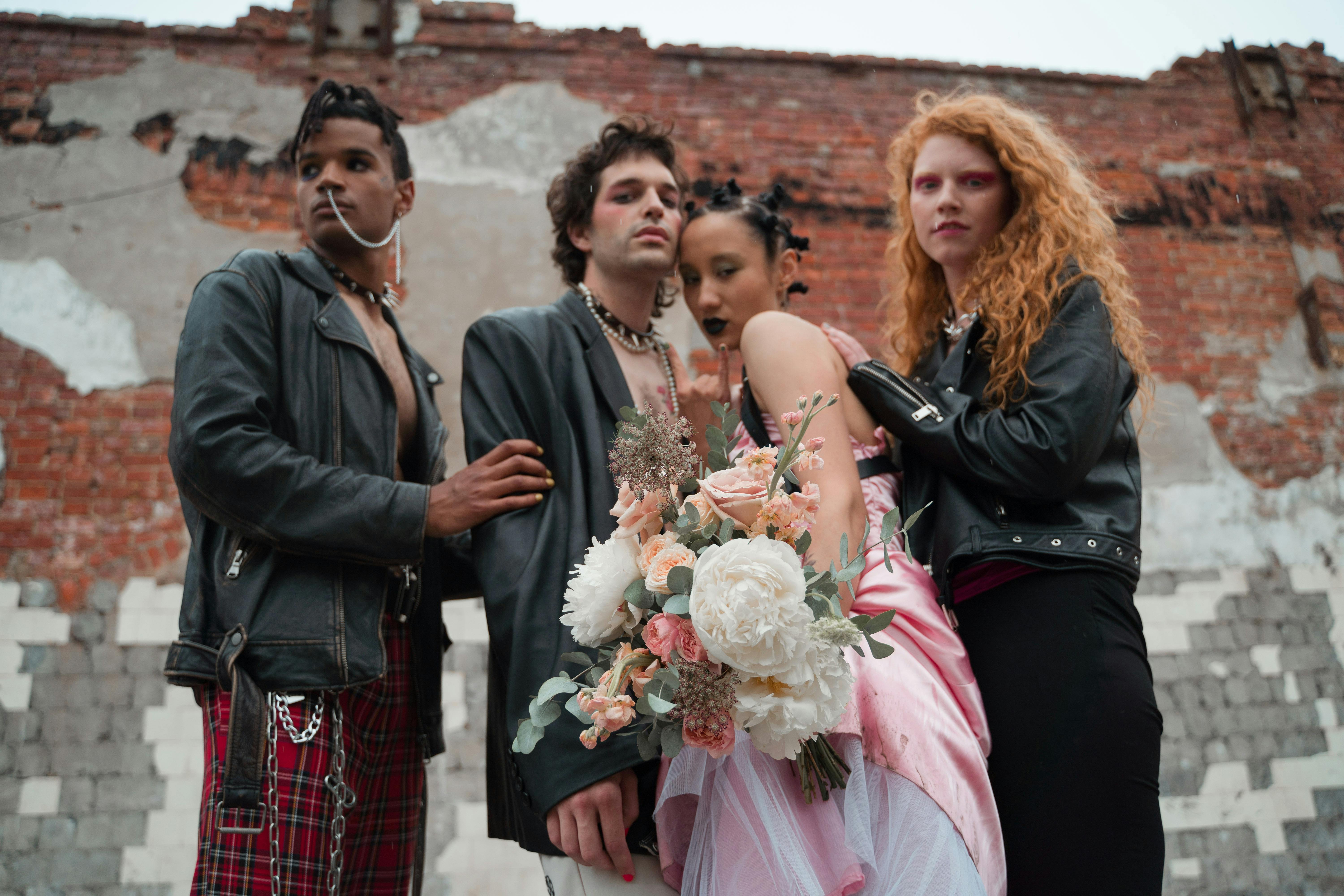 Stylish and modern punk-themed wedding photo featuring an alternative bridal party.
