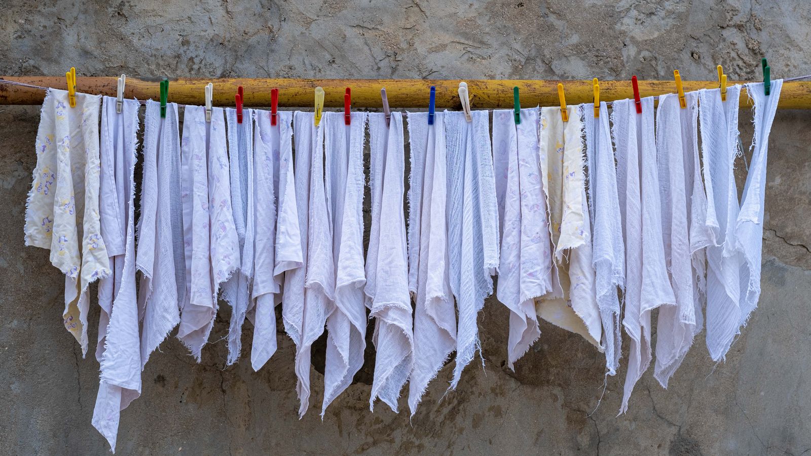 Washed rags drying on a clothesline, Togo