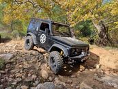 A Black Jeep Wrangler on a Rocky Dirt Road