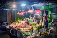 Assorted Fruits Displayed on Market During Night Time