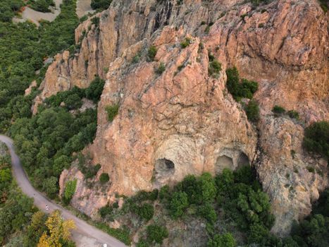 Discover the breathtaking beauty of this rocky mountain formation surrounded by lush greenery.