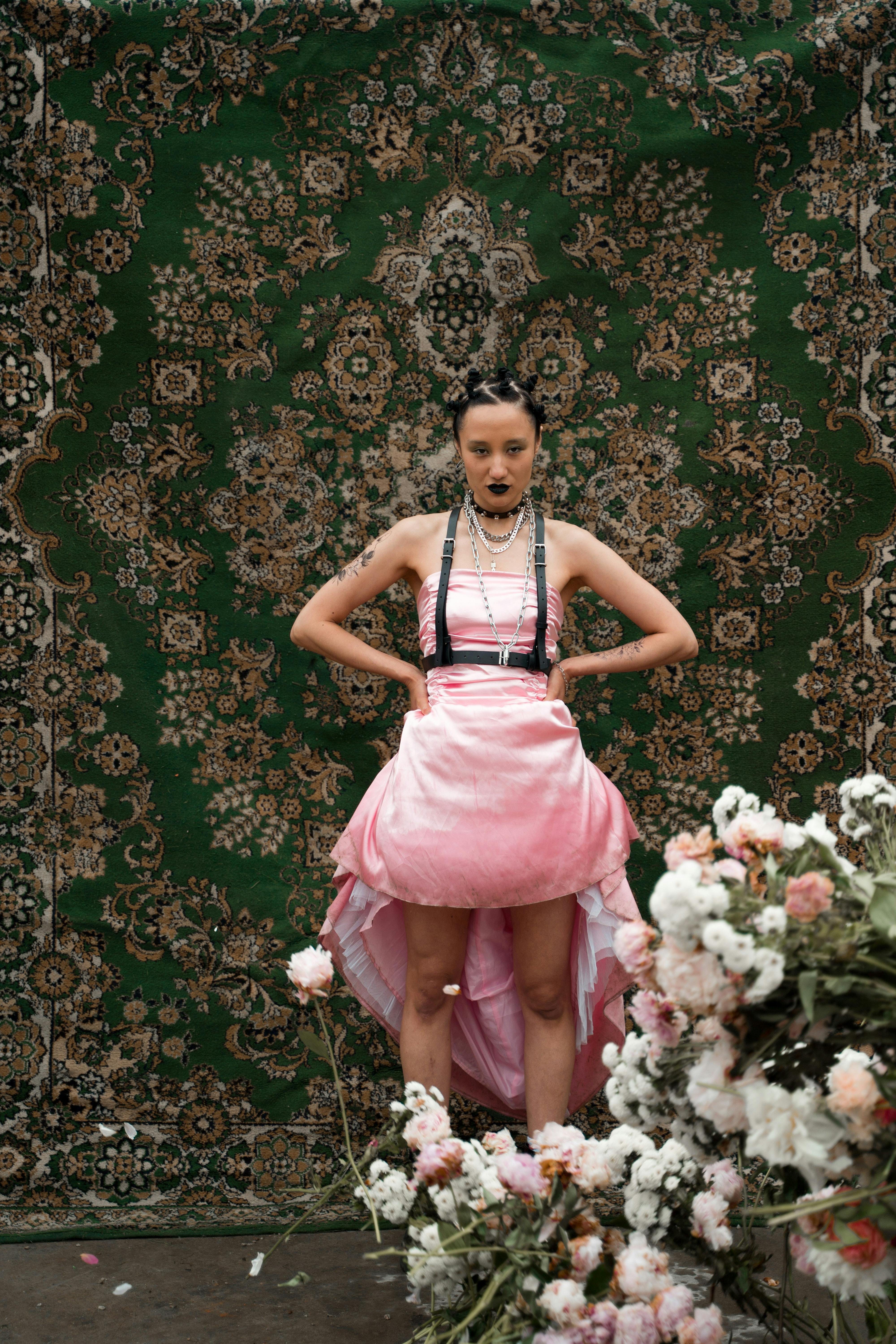 Woman in Pink Dress and Black Boots Standing  Free Stock Photo