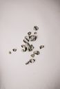 White and Brown Stones on White Surface