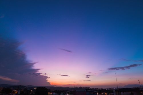 Free Beautiful dusk sky over Santiago de los Caballeros with vibrant colors. Stock Photo