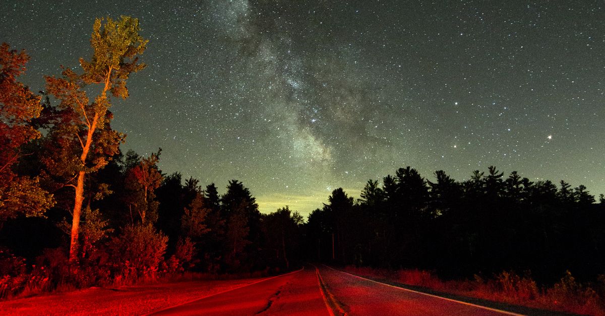 Red Light reflection On Road Under Night Sky · Free Stock Photo