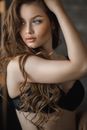 Attractive Woman with Long Brown Hair in Black Bra 