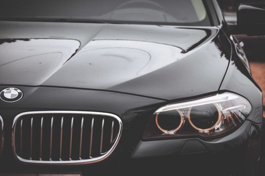 A Black Bmw Car with Headlights