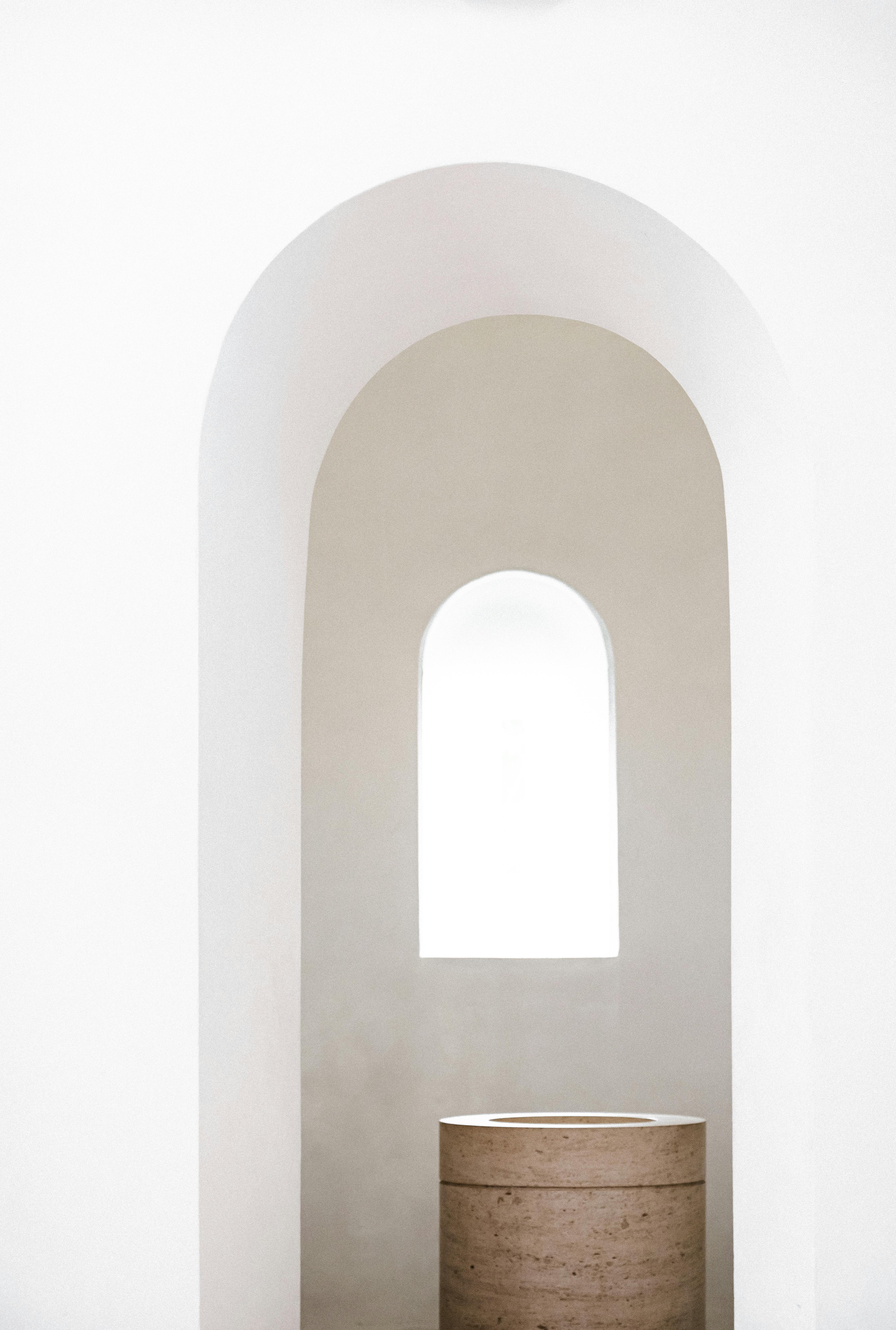 Elegant minimalist archway with window in Augsburg, Germany church.