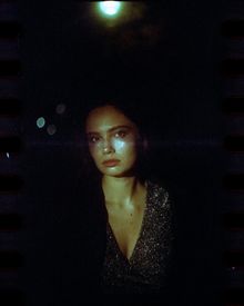 Night portrait of a woman in a sparkling dress, photo by Nurlan Tortbayev on Pexels