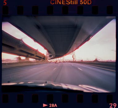 A cinematic view under a viaduct on a highway in Saint Petersburg, Russia, showcasing a vibrant cityscape.