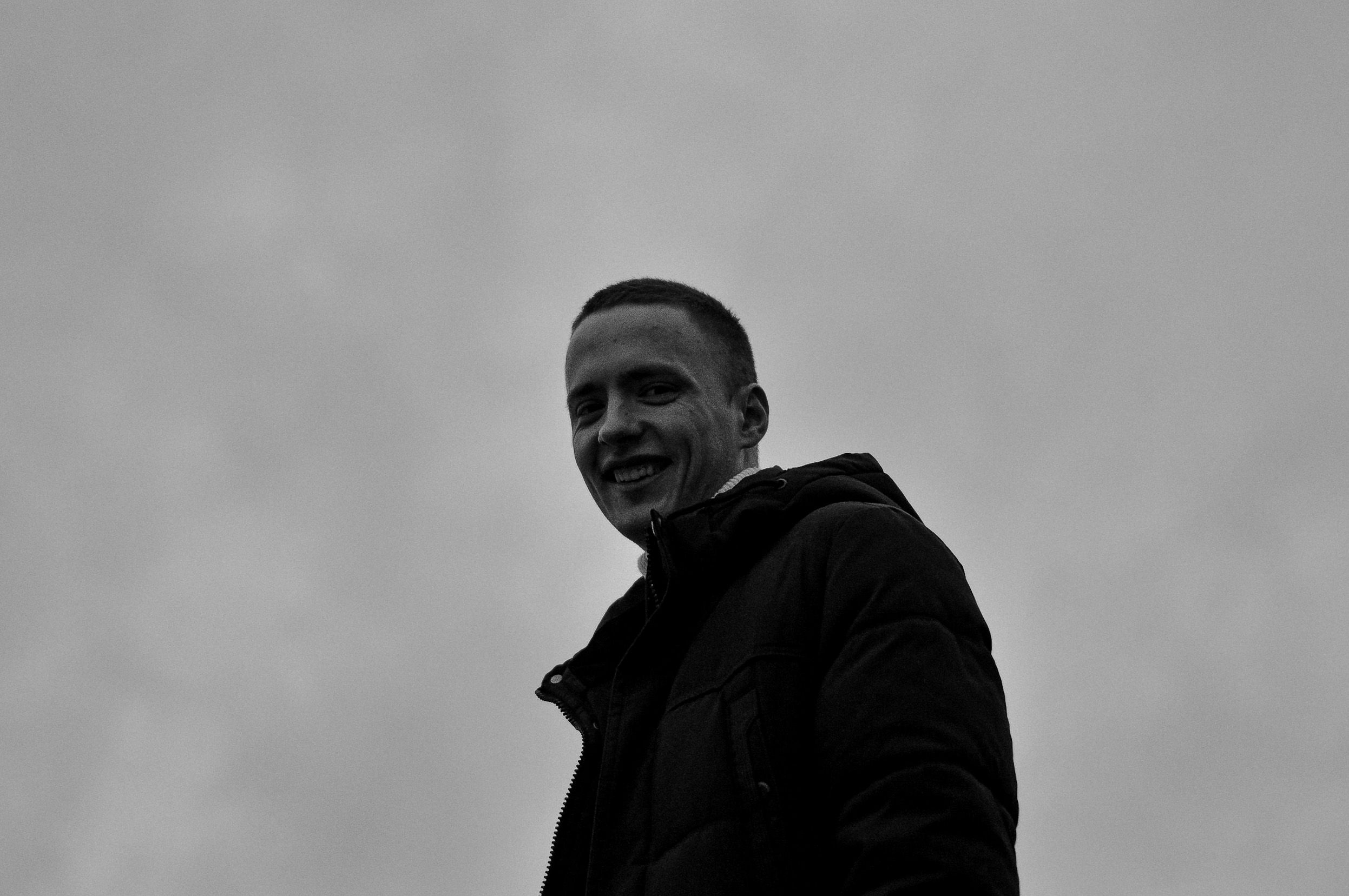 A Grayscale Photo of a Man in Black Jacket · Free Stock Photo