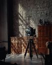 Vintage Tripod Reflector Standing in Eclectic Interior