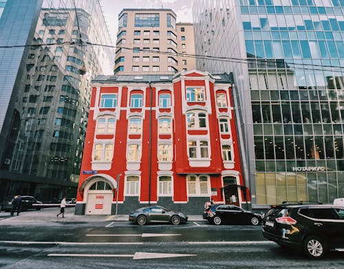 A Red and White House in The City