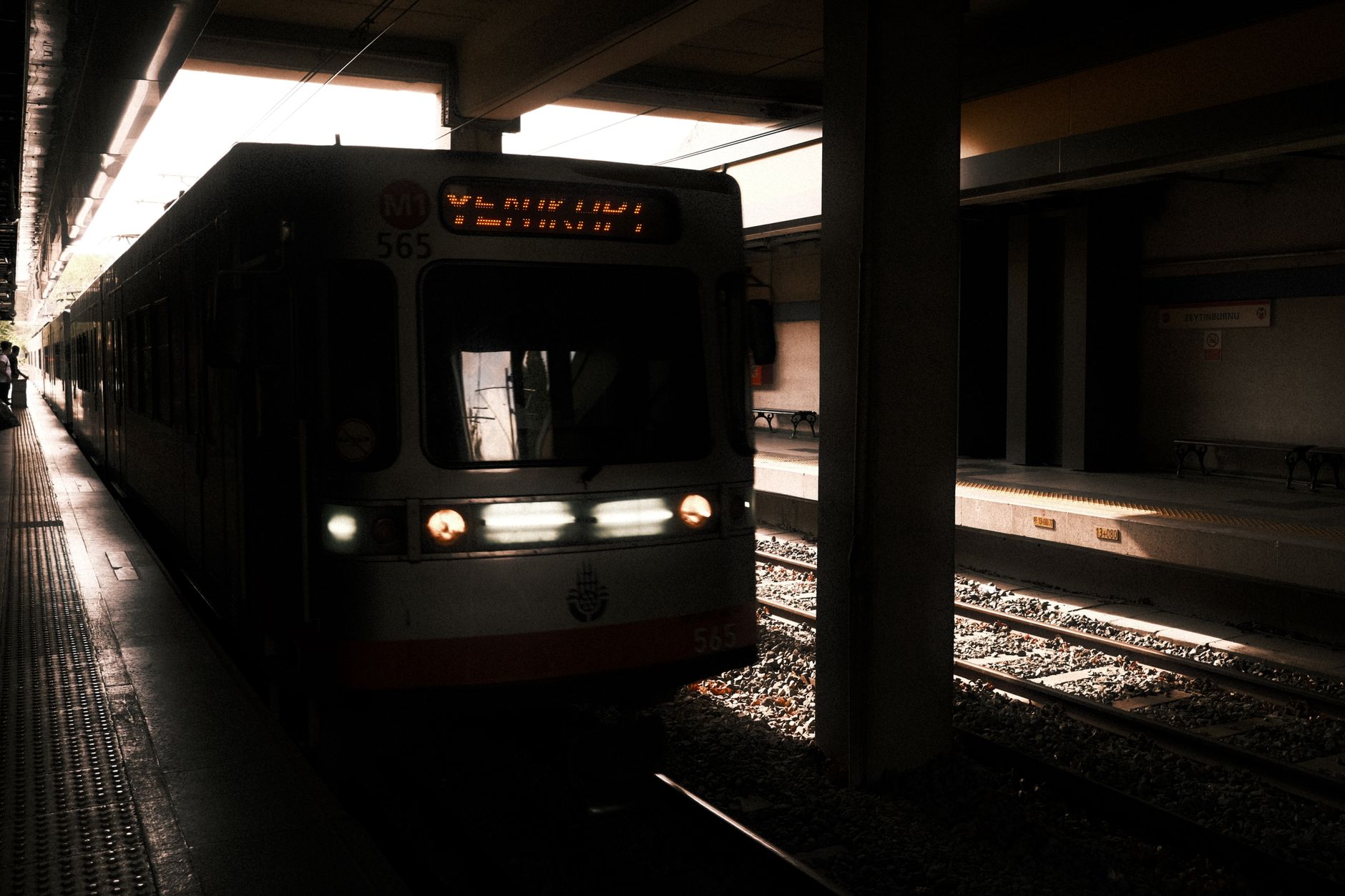 MARTA train arriving near Downtown Atlanta as World Cup fans walk toward the stadium