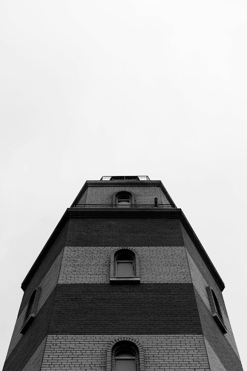 Grayscale Photo of Tower 