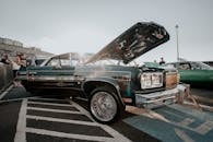 Old Car with Open Doors and the Hood