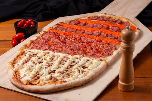 Free A Pizza on Wooden Tray Stock Photo
