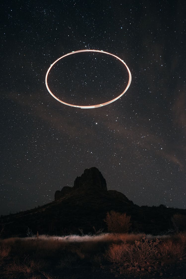 Drone Making Light Circle In Sky At Night