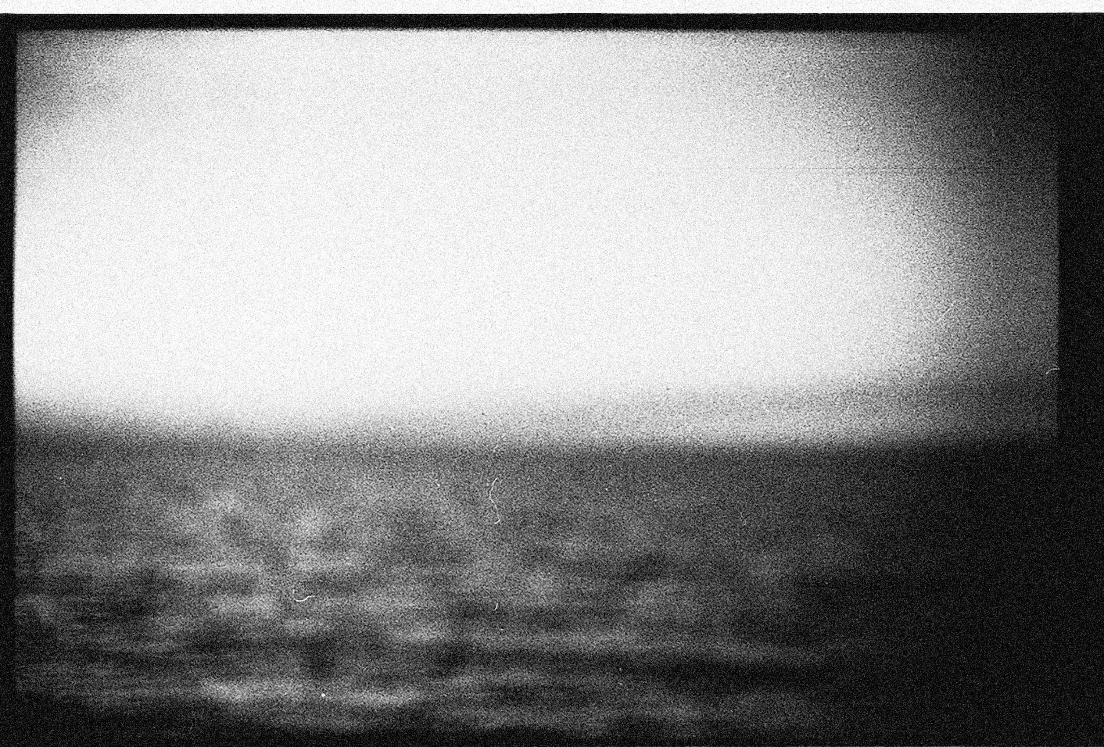 A timeless black and white abstract seascape with artistic blur effect.