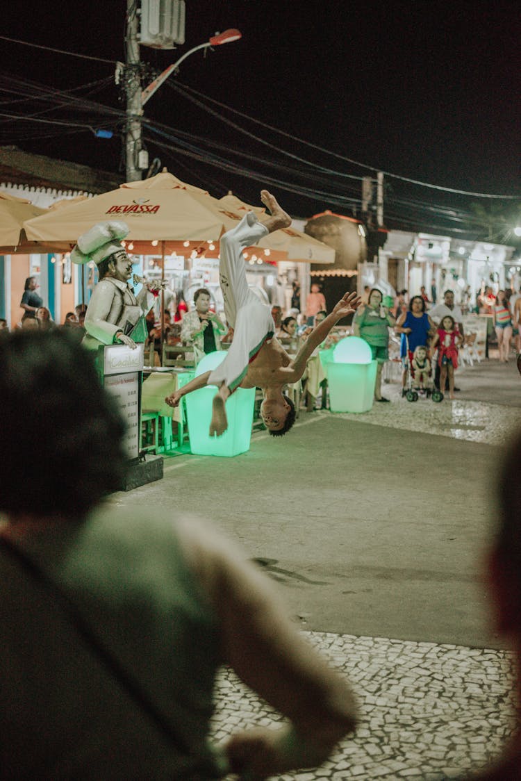 Man Doing Stunts At Night