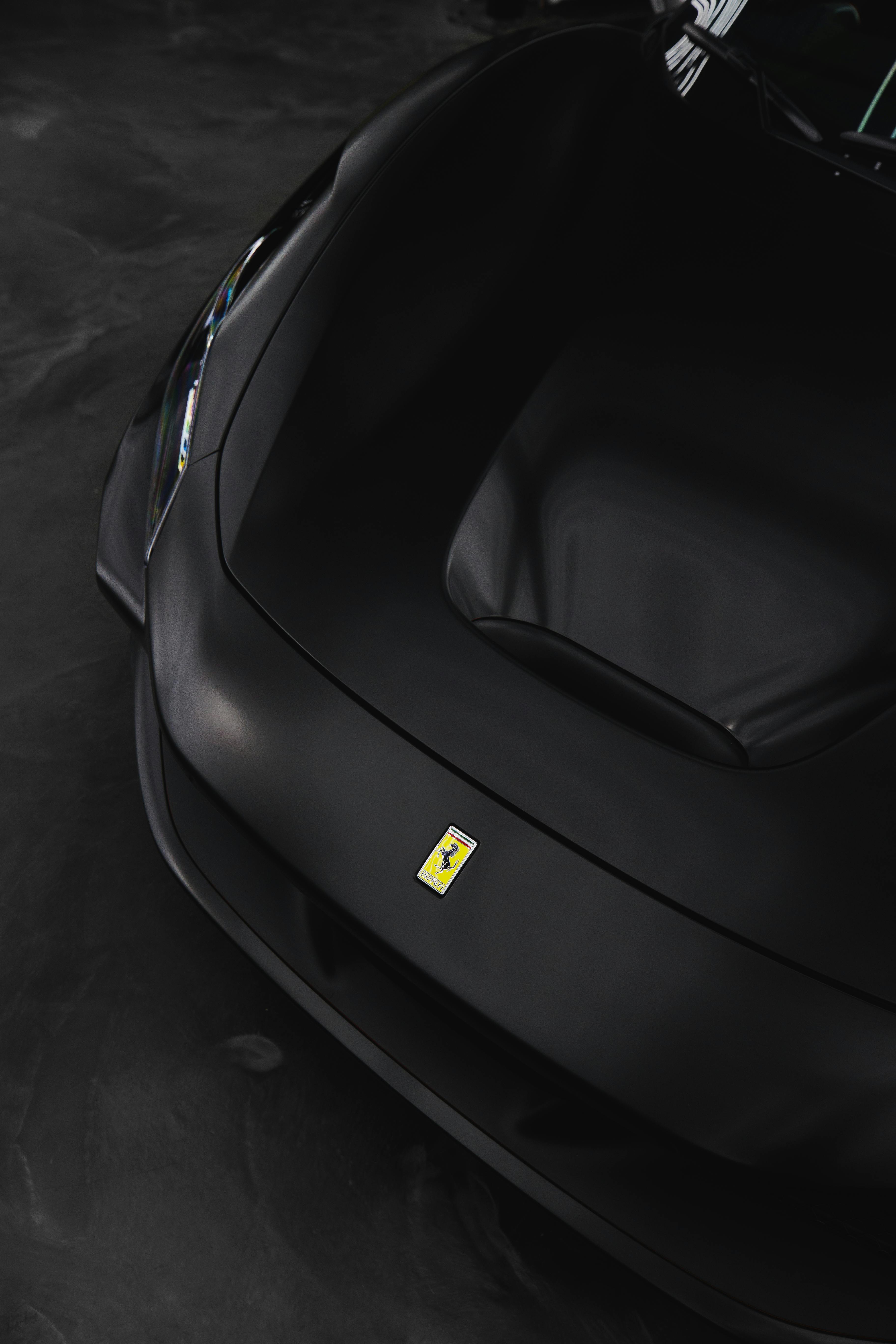 Black Ferrari Car on Gray Pavement · Free Stock Photo