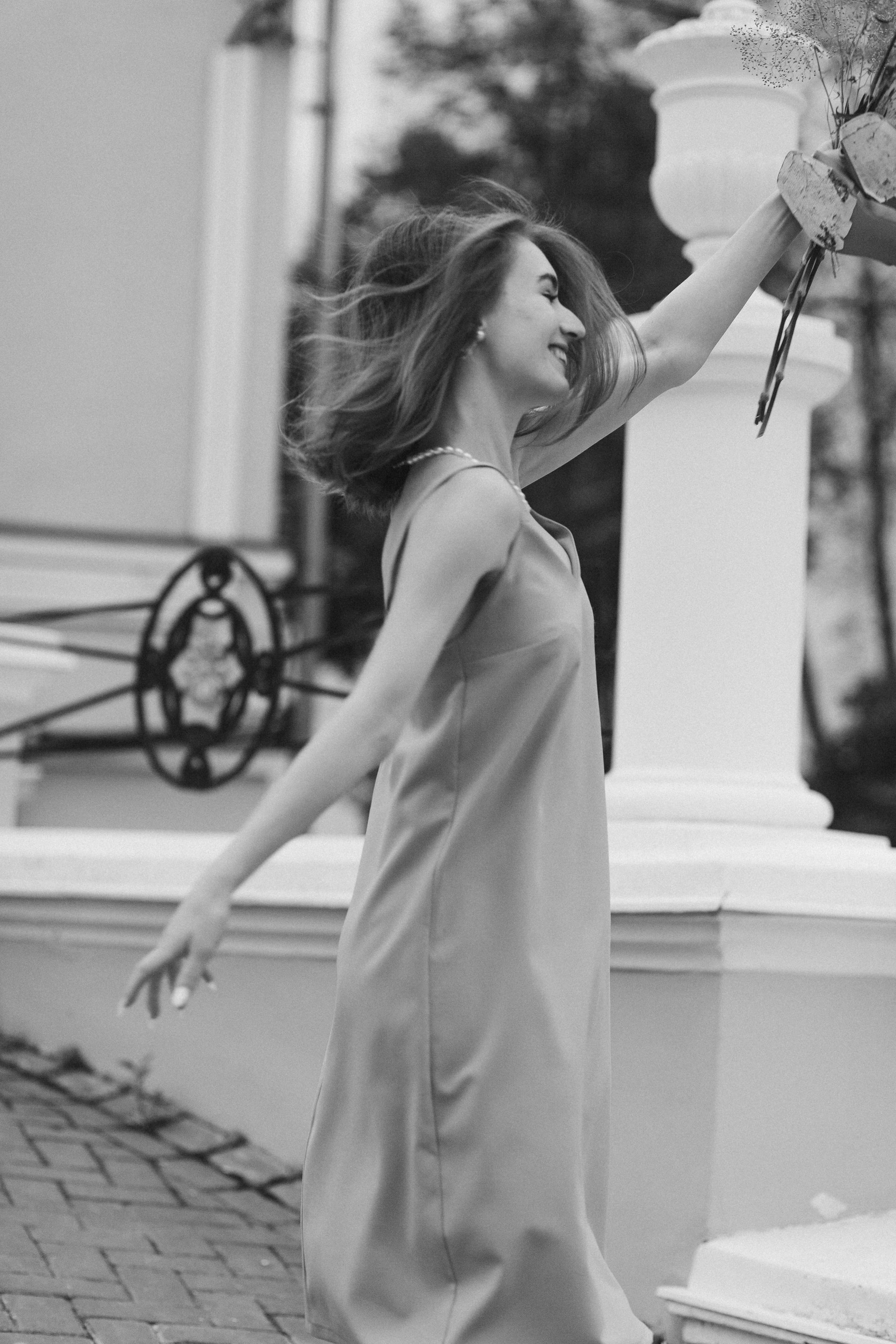 Grayscale Photo of a Woman Wearing Dress · Free Stock Photo