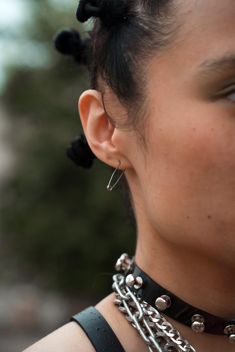 Woman Wearing Punk Choker And Chain Necklaces