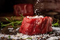 Raw Meat on White and Green Floral Textile