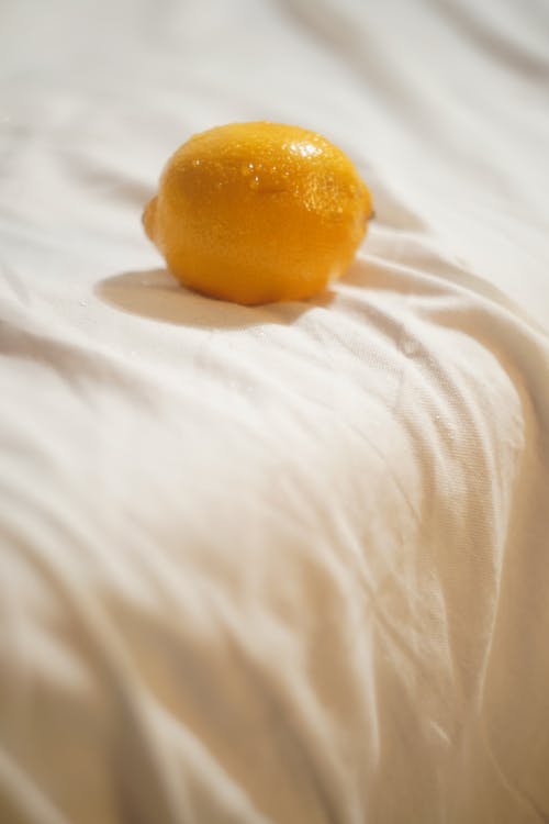 Yellow Lemon on White Textile