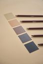 Blue and Brown Pencil on White Table