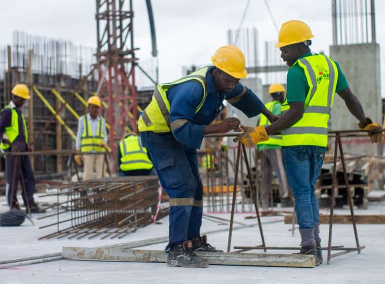 Construction crew working on a reinforced concrete structure