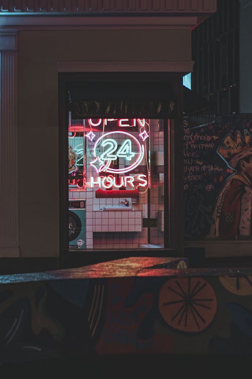 Neon on Food Bar Window at Night