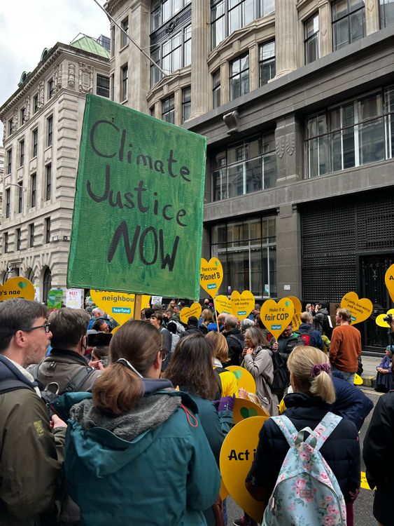Crowd Holding Climate Change Protest Signs · Free Stock Photo