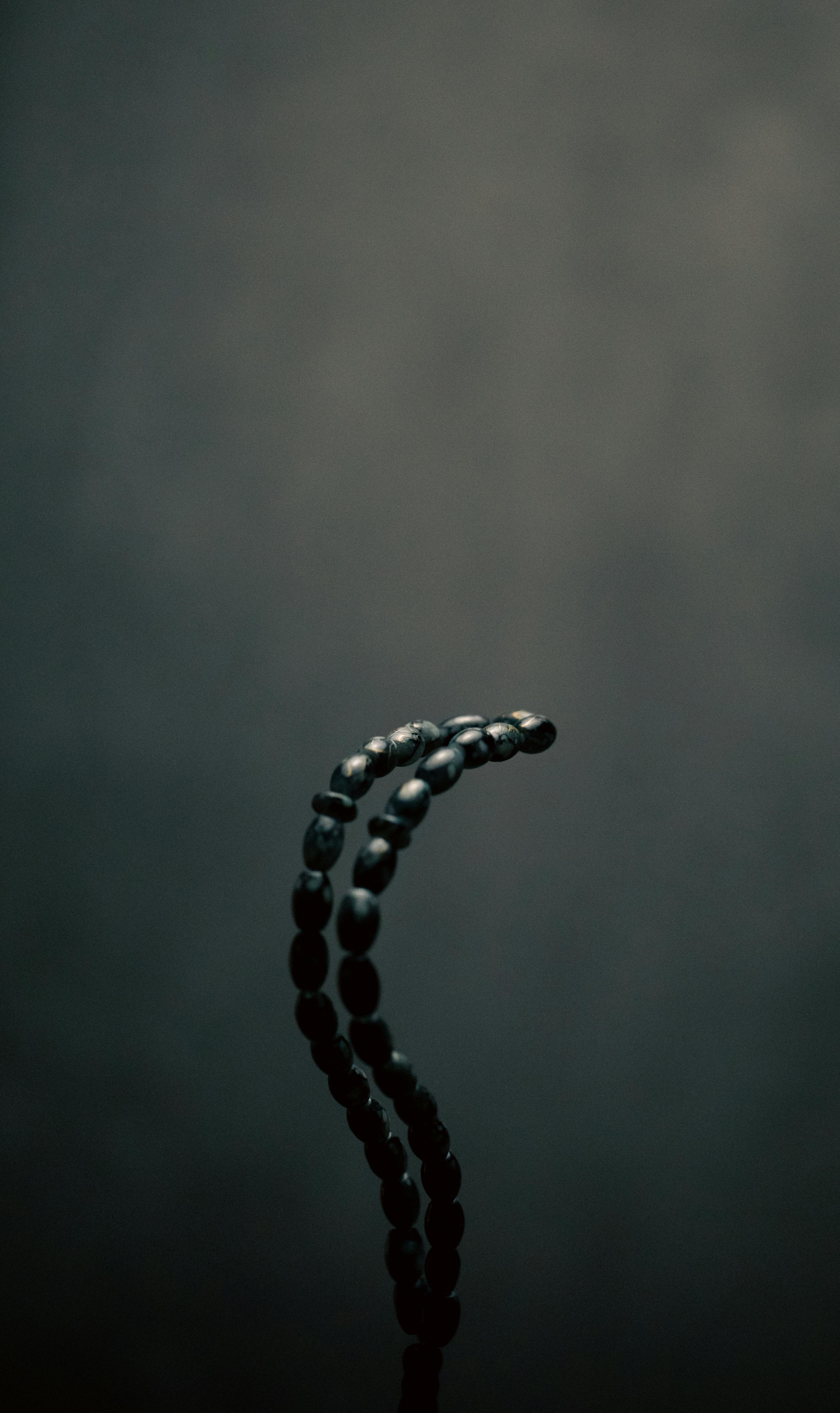 Rosary on Black Background · Free Stock Photo