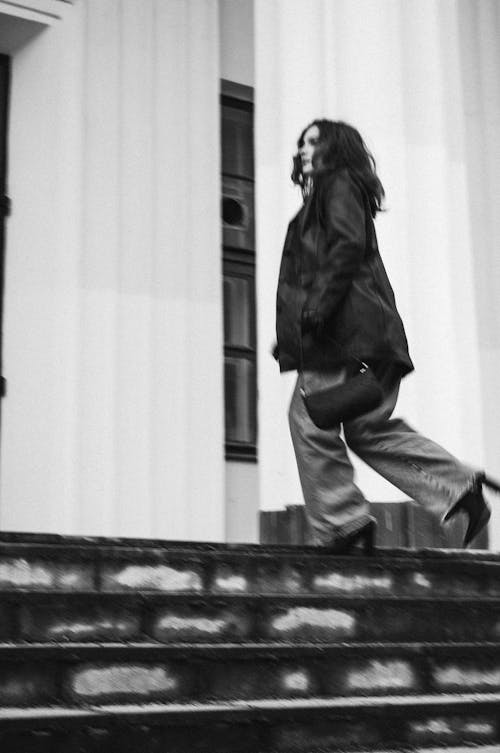 Woman Walking in Black and White