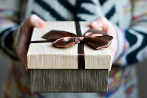 Free Gift Box with Brown Ribbon Stock Photo