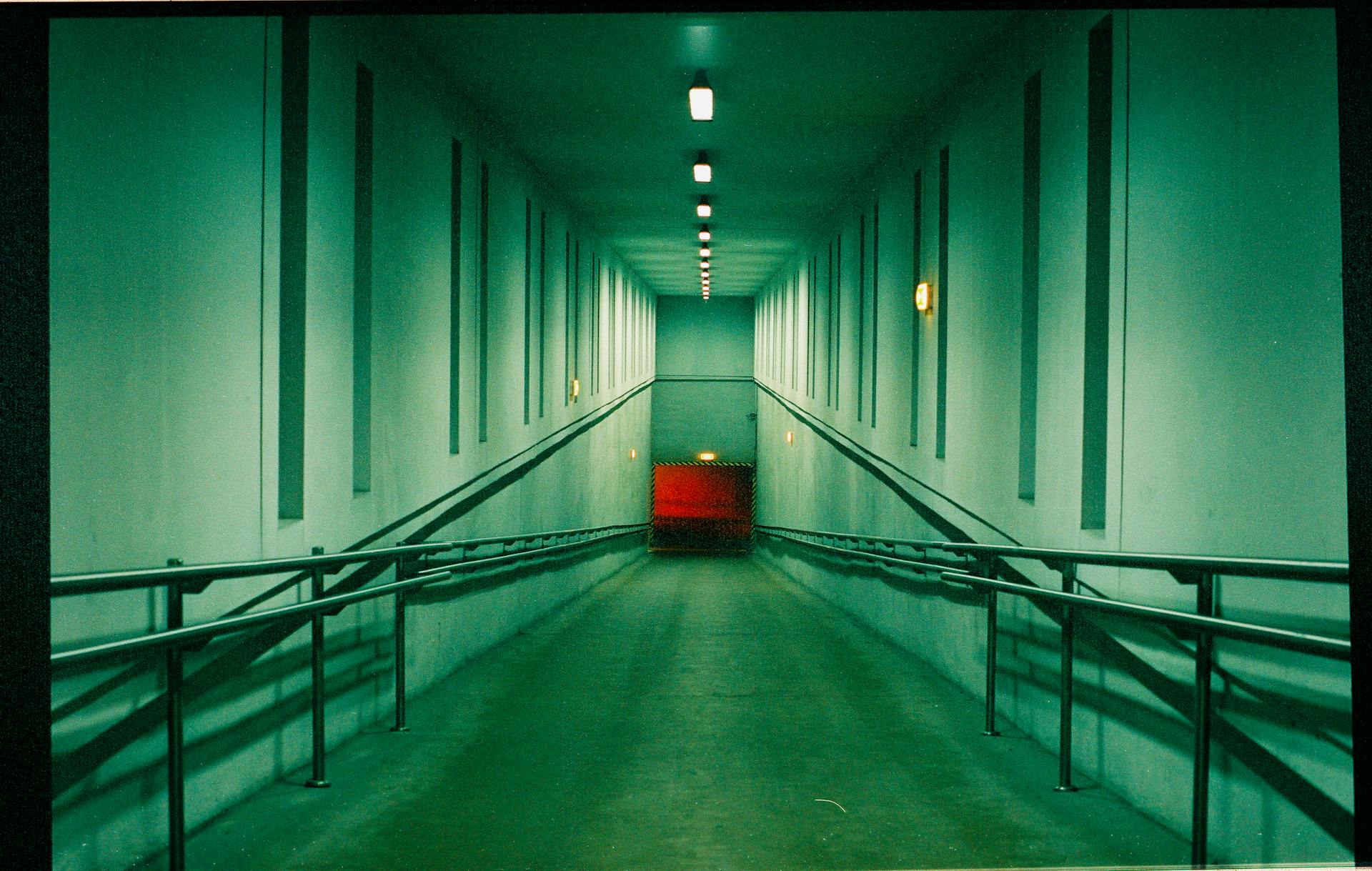 Empty Ramp with Metal Railings in a Building